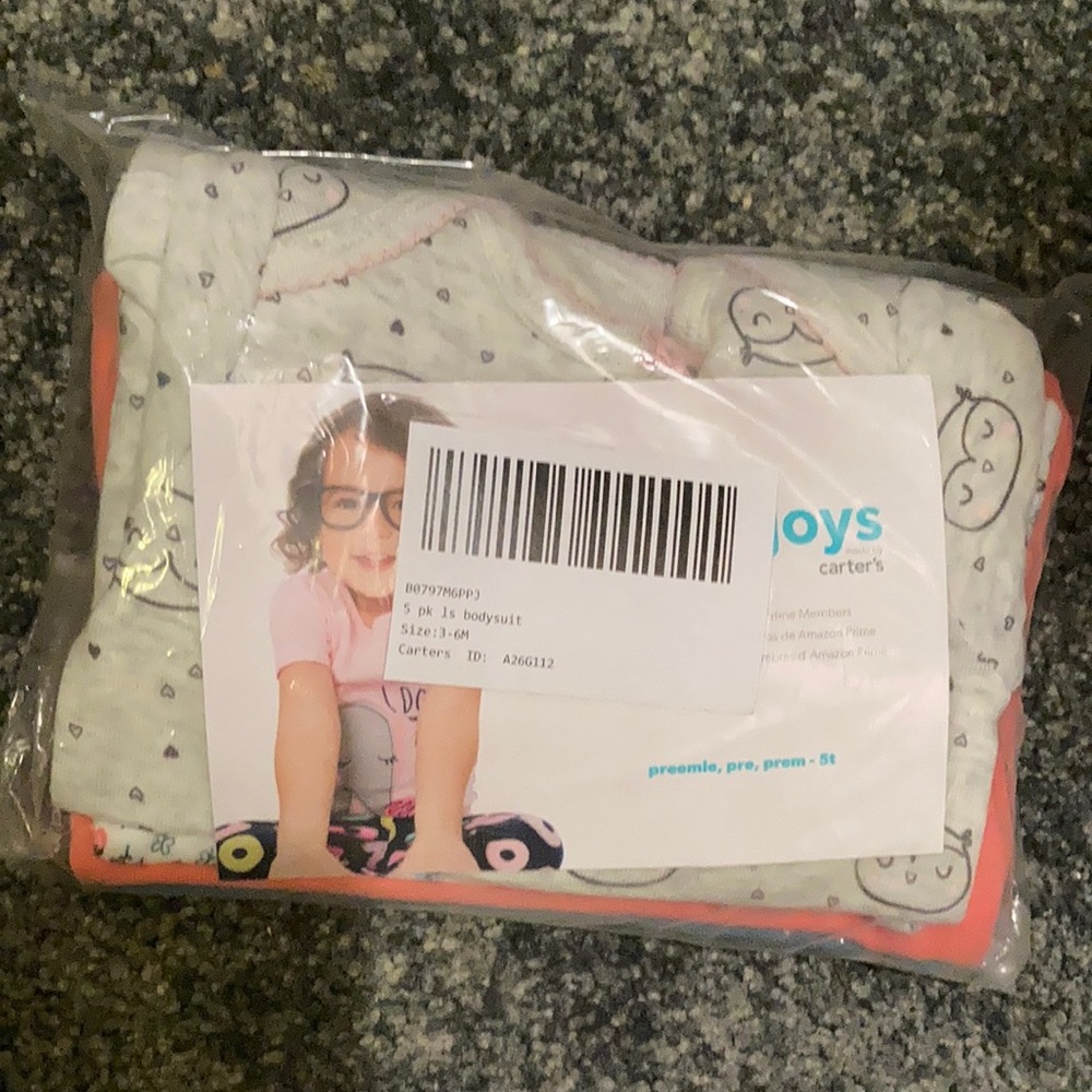 NWT never taken out of shipping bag. 5 pack of long sleeve bodysuits